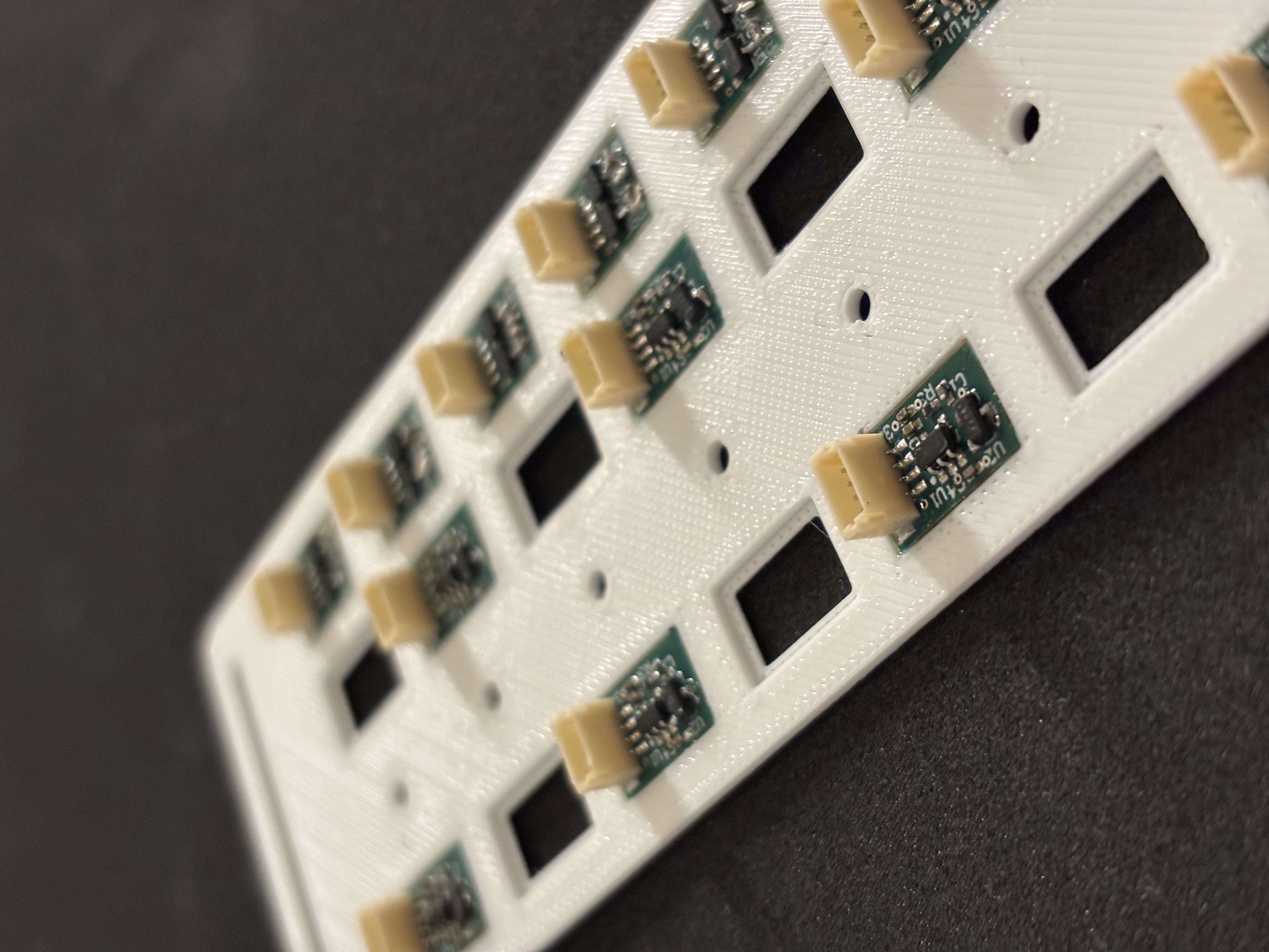 fNIRS sensor nodes mounted in a 3D printed carrier panel